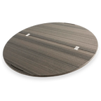 Round wooden Lazy Susan tabletop accessory with visible hinges and handle slot.