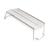Stainless steel grill warming rack with raised legs on white background