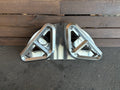Stainless steel grill accessory part on concrete and wood background