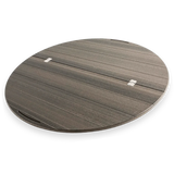 Round wooden lazy Susan turntable with metal hinges and handle slot, outdoor dining accessory